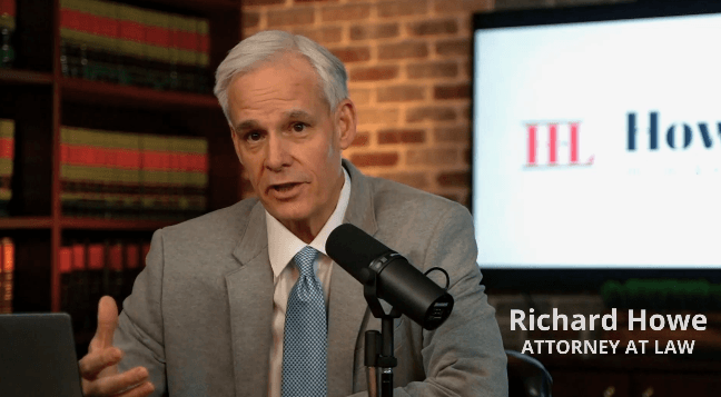 Richard Howe, Atlanta attorney at law, speaking at a microphone in a studio